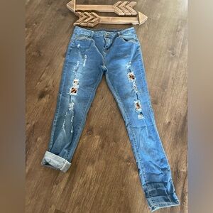 Distressed peek a boo leopard print jeans. Boyfriend fit
